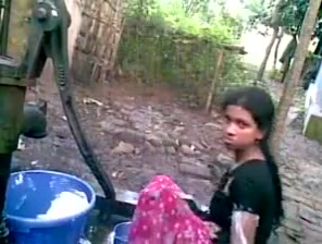 Indian school nymph outdoor bath