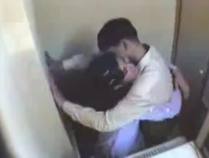 Indian female having joy with her beau in internet cafe